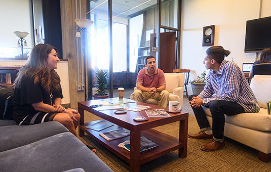 Sociology professors with student in Mosakowski Institute