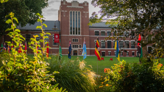 Clark University campus with international flags