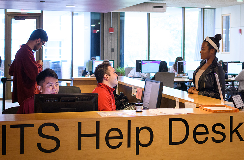 Students working at ITS help desk