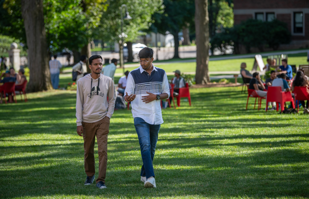 Students walking through red square during international student welcome