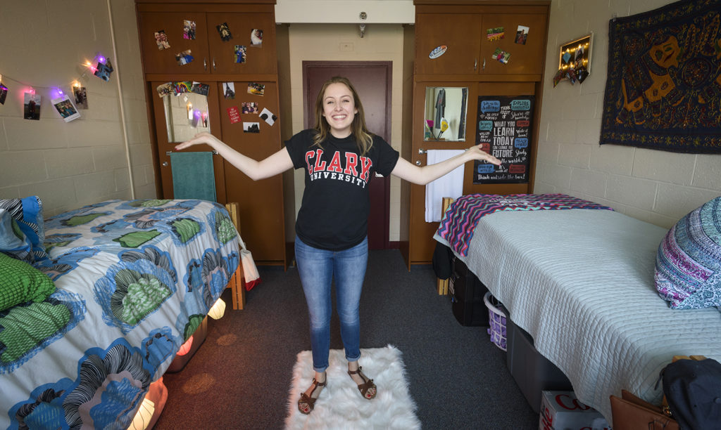 Girl standing in Wright Hall dorm room