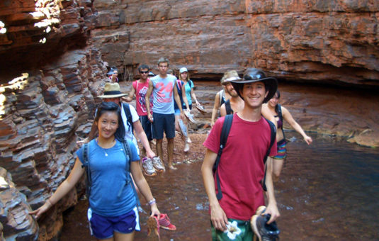 students in canyon river