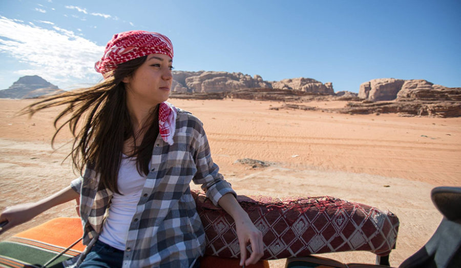 female student looking over desert