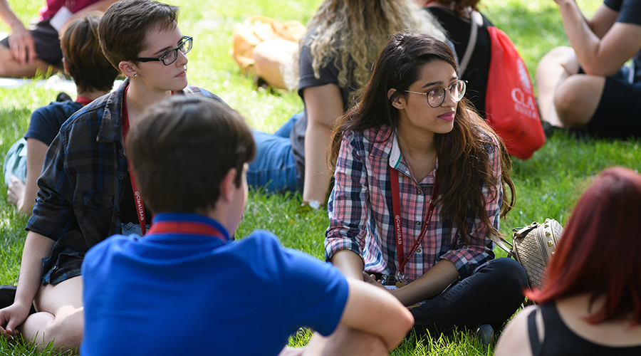 Students sitting on gras