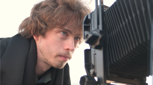 Dan Gillooly '25 with a large-format camera