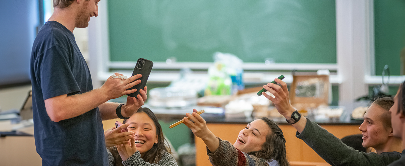 students looking at phones