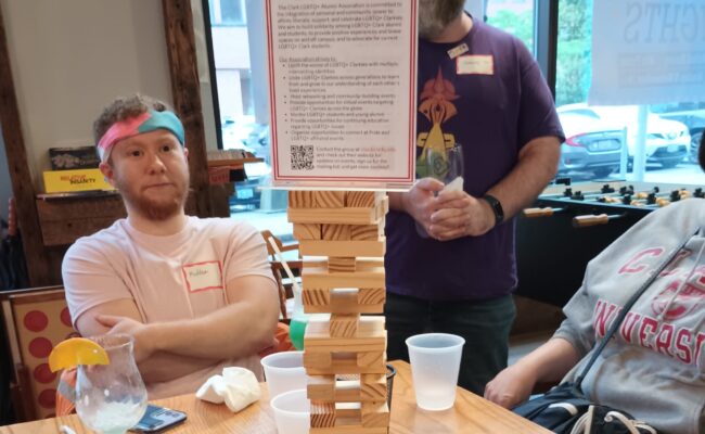 Attendees playing Jenga at Providence Pride Meetup 2023