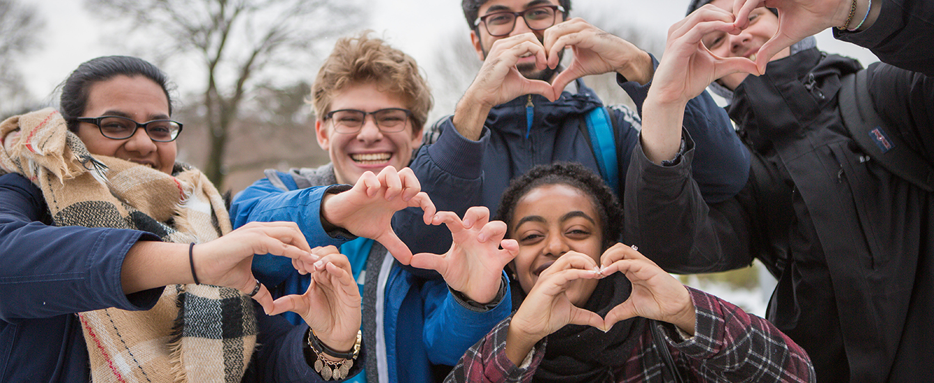 students making hearts