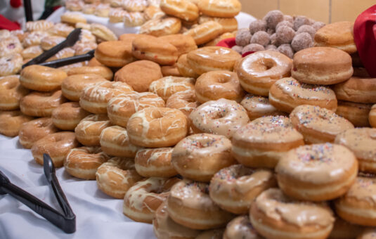 Table with glazed donuts