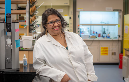 Female professor in lab environment