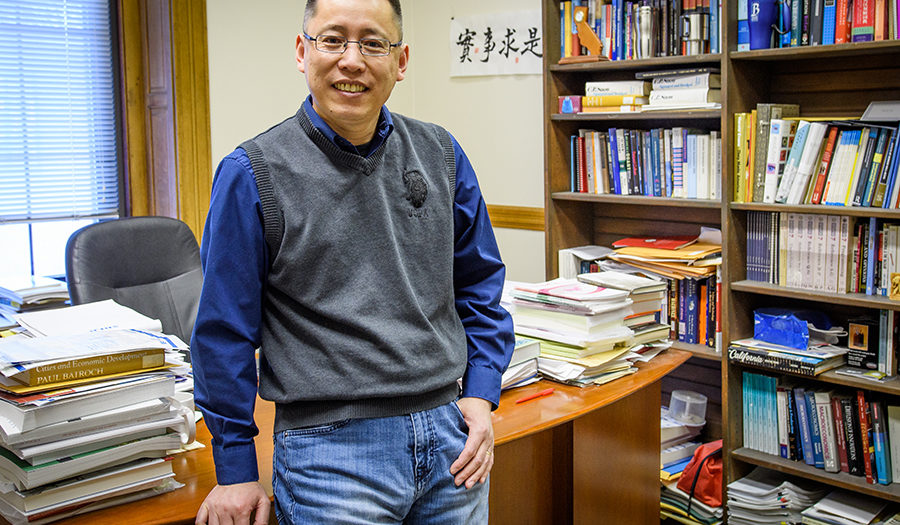 Junfu Zhang in his office