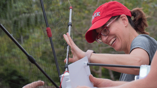 Florencia Sangermano attaching a recorder to a raft