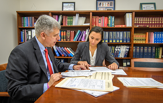 Student working with lawyer