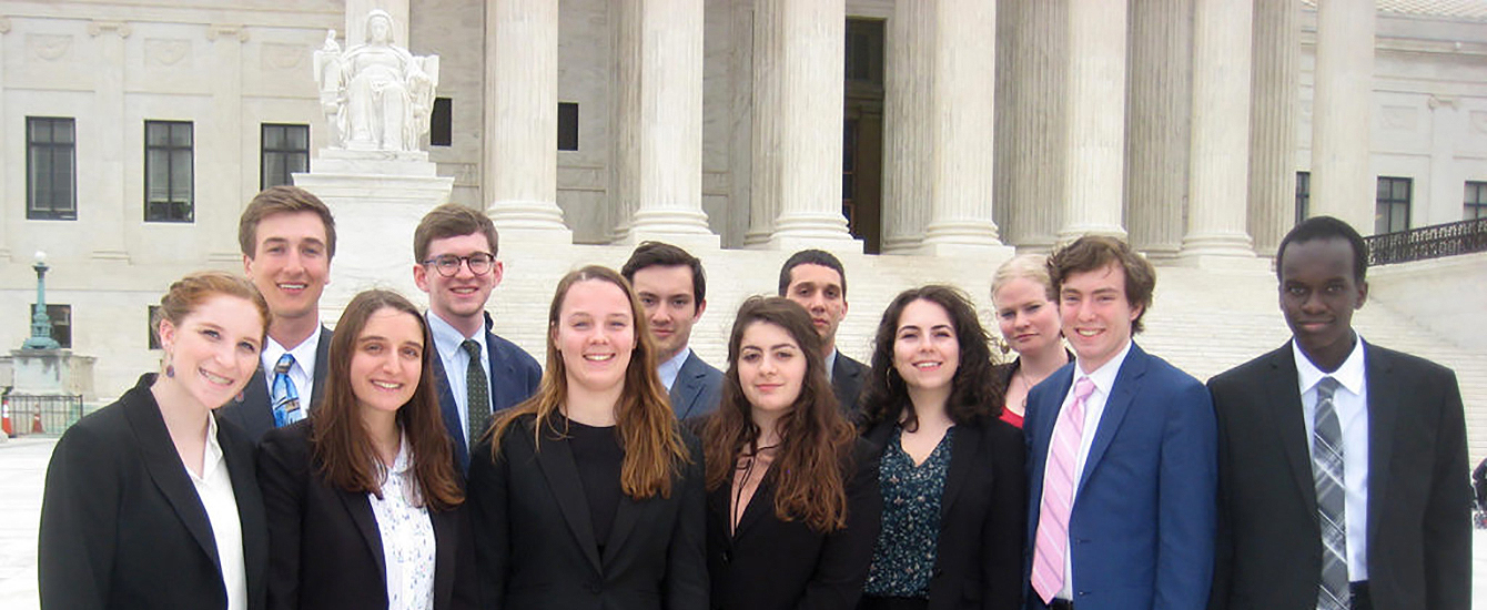 political science students standing in front of state ho