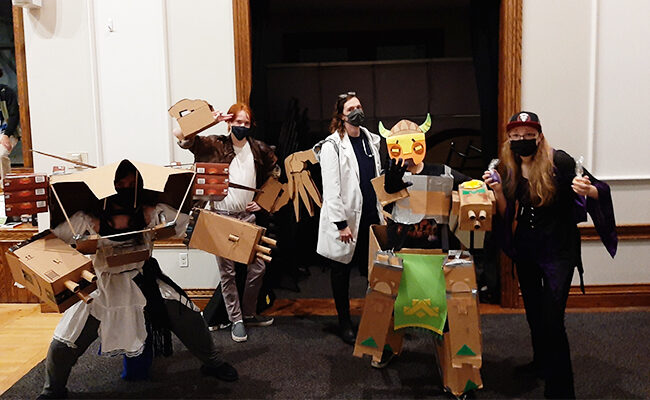 Gamers cosplaying in cardboard boxes