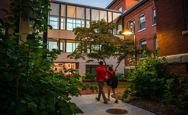 students walking into courtyard at math physics building