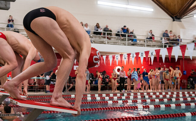 Kneller Athletics Center - diver jumping off board in pool area