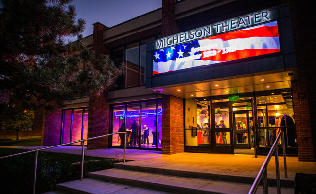 Michelson theatre signage in red, white, blue flag