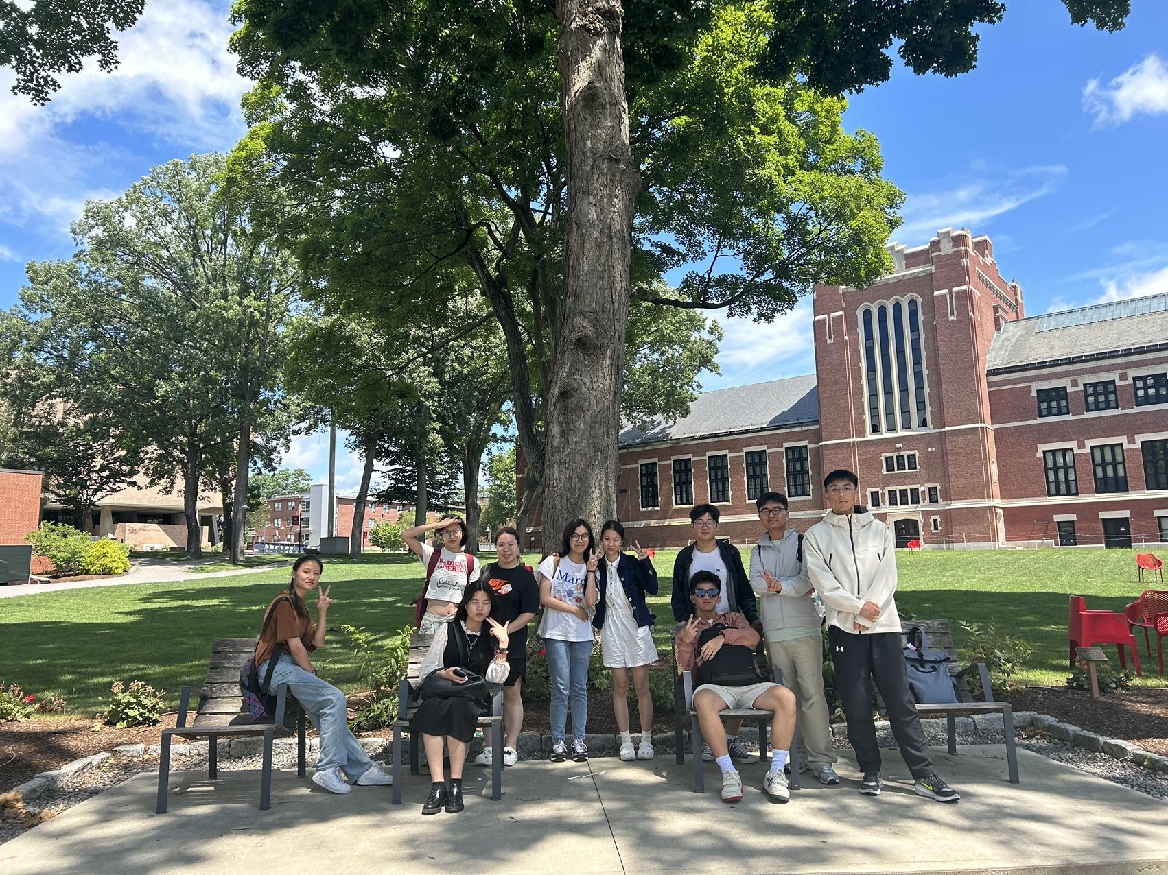 A picture of the HFUT 2024 Summer Cohort smiling on Clark U's Red Square