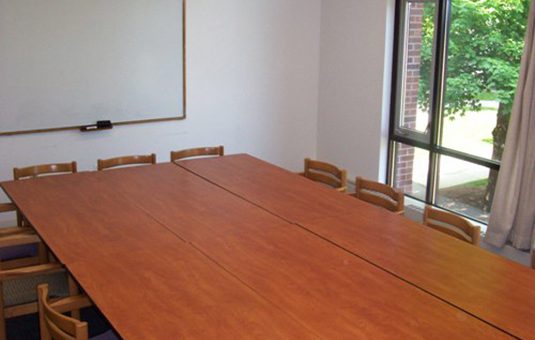 Persky family conference room with table and chair