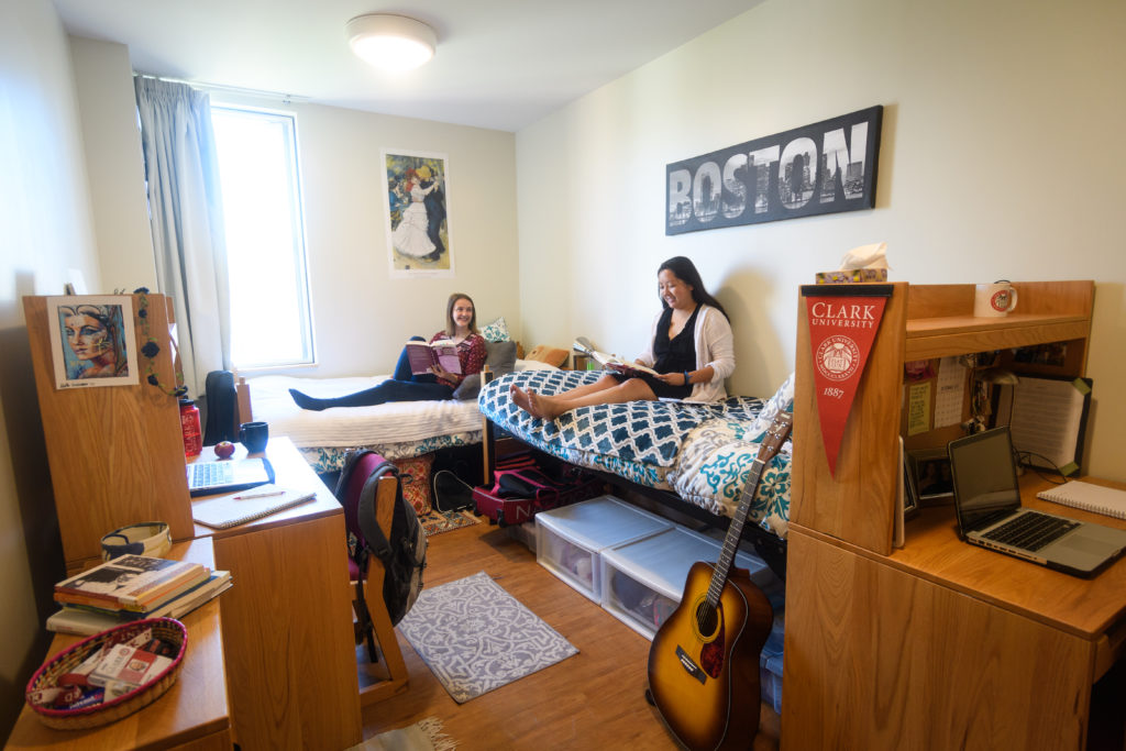 blackstone hall double bedroom with two women sitting and reading on beds