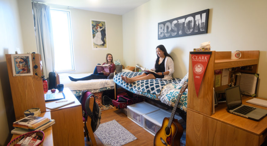 blackstone hall double bedroom with two women sitting and reading on beds