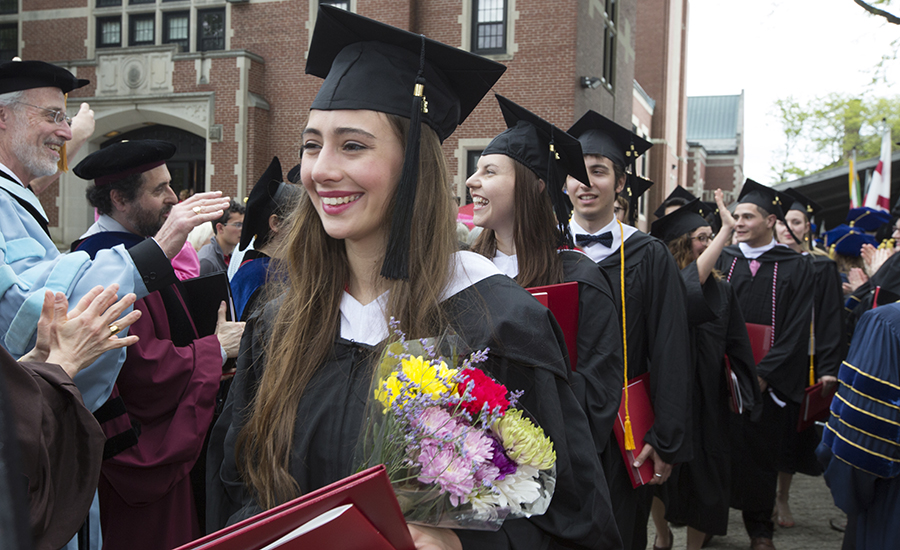 Student in mortar board in Commencement procession