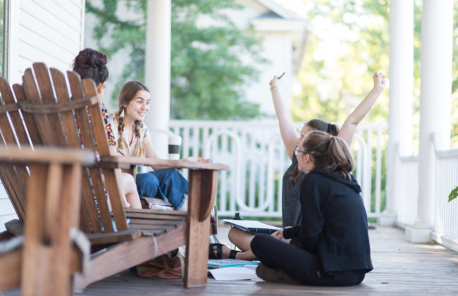 students on front porch