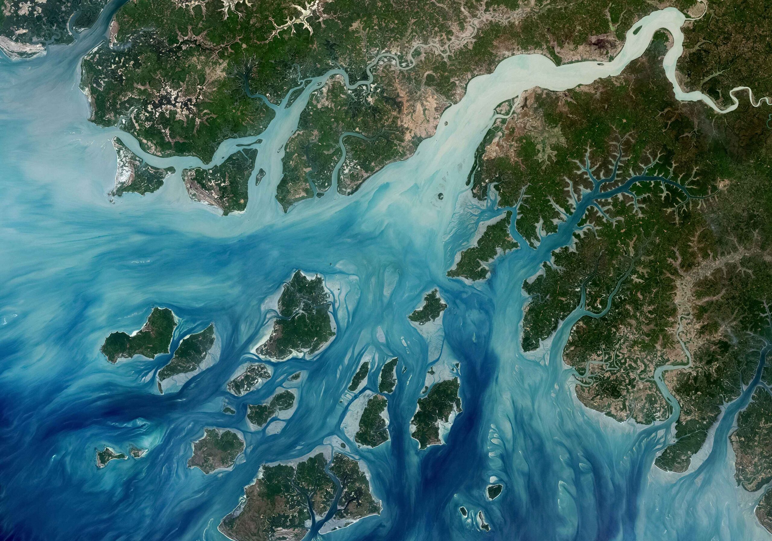 Satellite image, illustrating the GIS research in the Geography Department, courtesy of the USGS on Unsplash