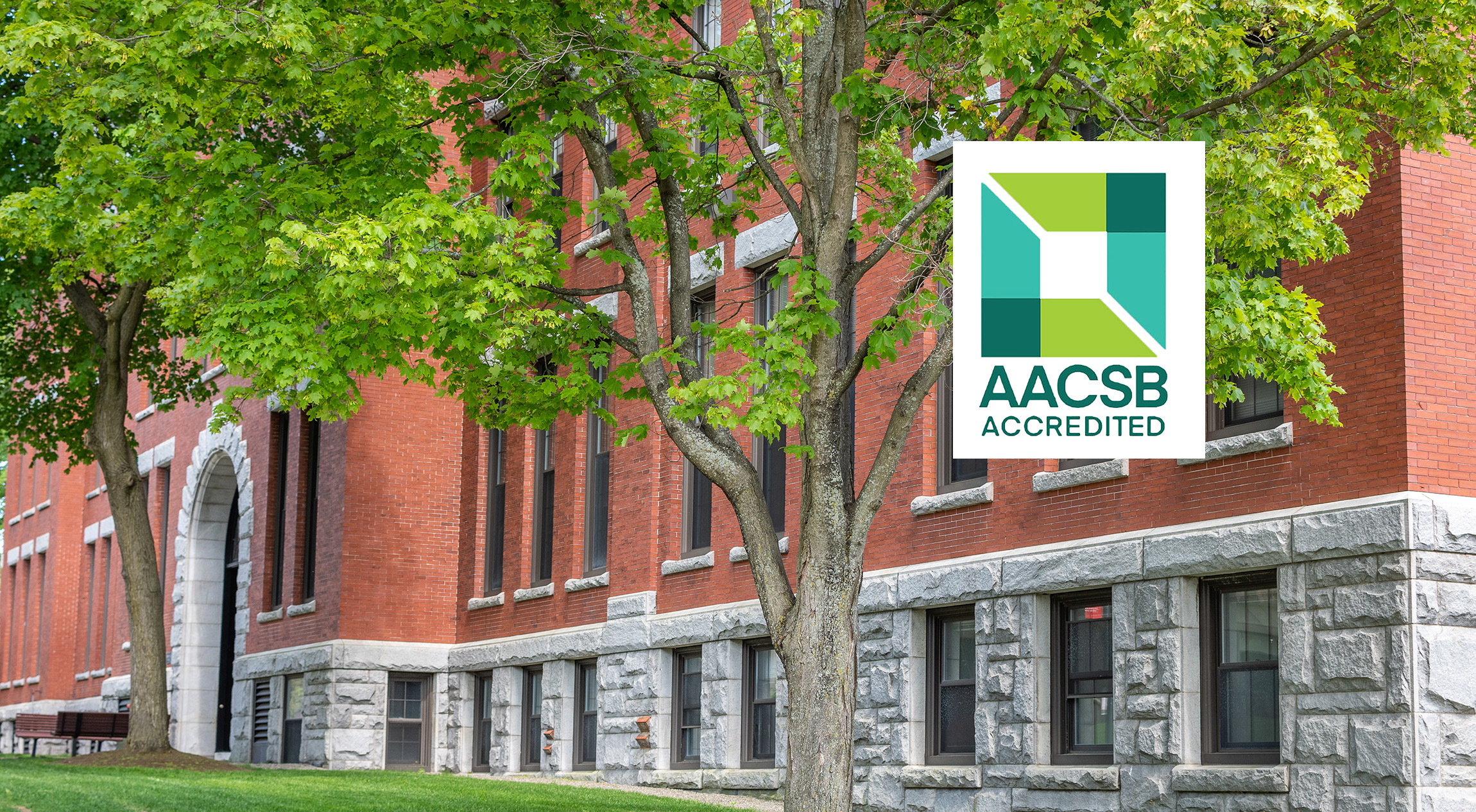 Carlson Hall. with AACSB Accredited logo