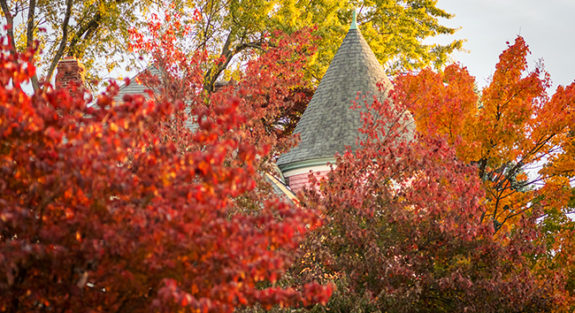 Alumni House with fall foliage