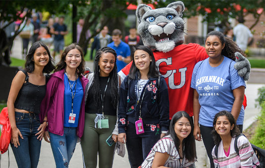 Group of students with Clark mascot
