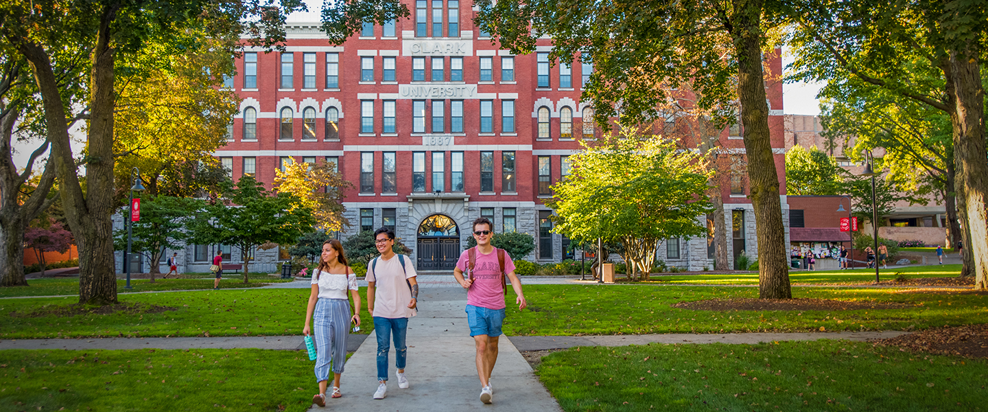 People walking across campus