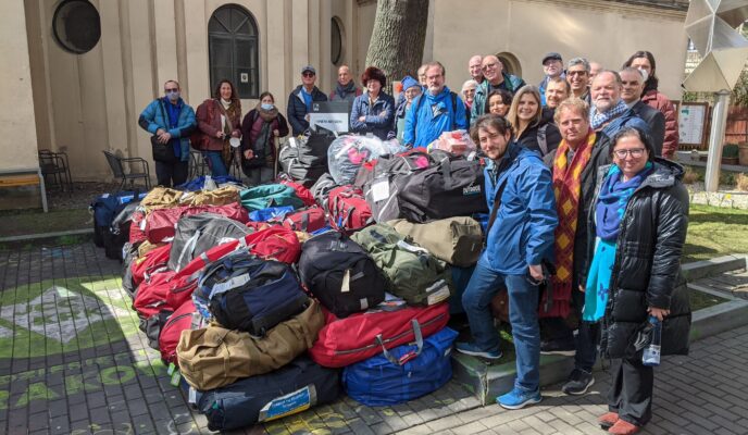 Rabbi and others gather goods for refugees