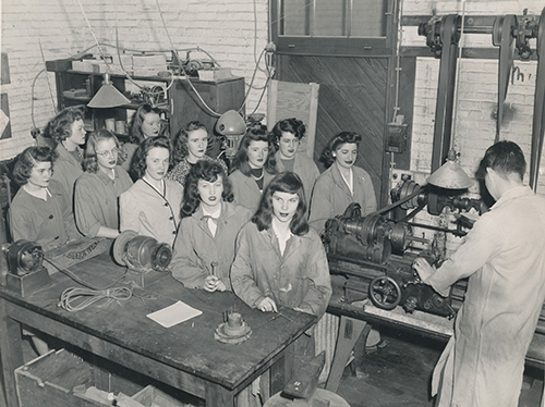 historical photo with woman in factory setting