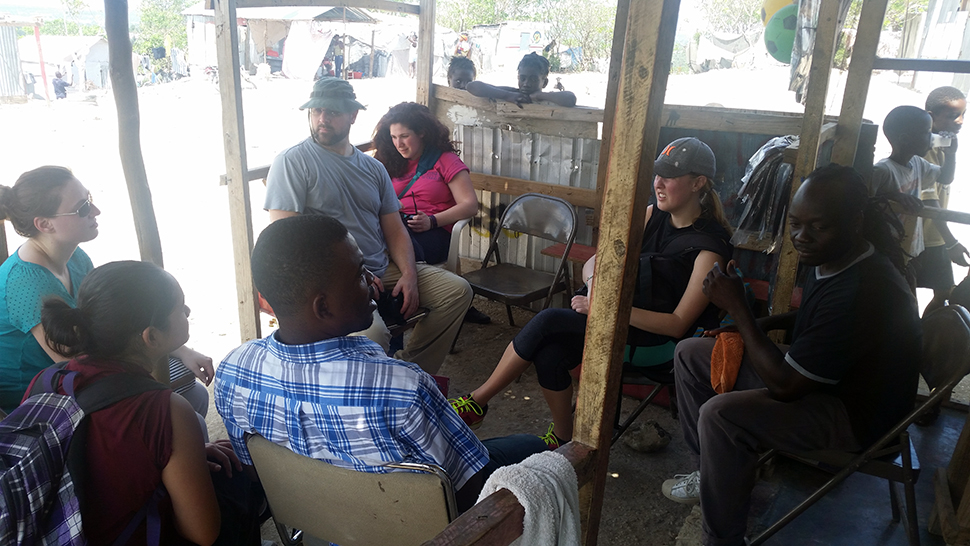 A meeting inside a refugee camp