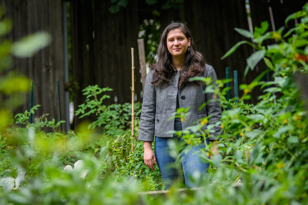 Priyanka K. Naithani standing in a garden