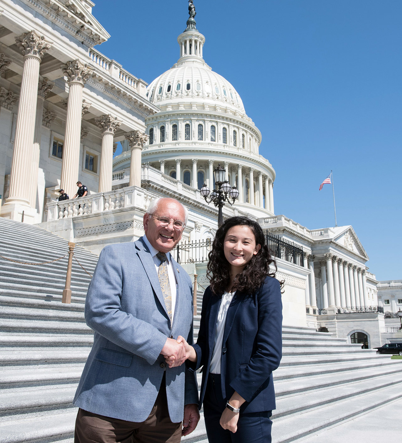 Sara Conroy shakes the hand of congressman Paul Tonko, on steps of Capitol in Washington, D.C.