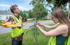 HERO Fellows Benjamin Ryan and Shannan Reault measure a tree in Leominster.