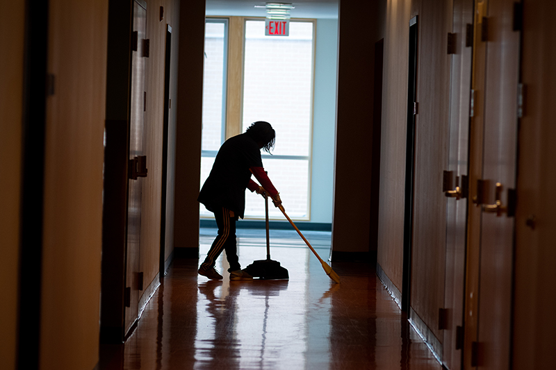 Facilities worker cleans Blackstone Hall