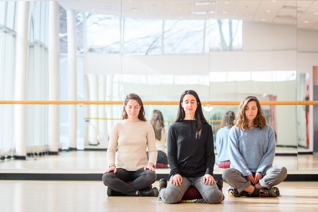 Students gather for mindfulness meditation prior to social distancing
