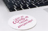 Sticker on laptop saying "I got my COVID-19 vaccine appointment"