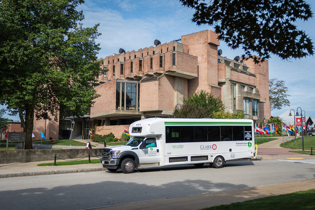 Clark Shuttle bus in front of Goddard Library