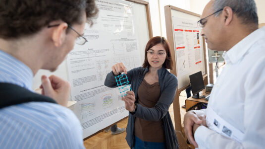 A student presents research during a previous showcase of undergraduate work.
