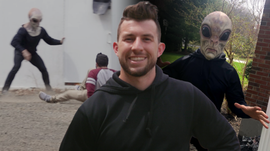 Alex Turgeon in front of alien video scene