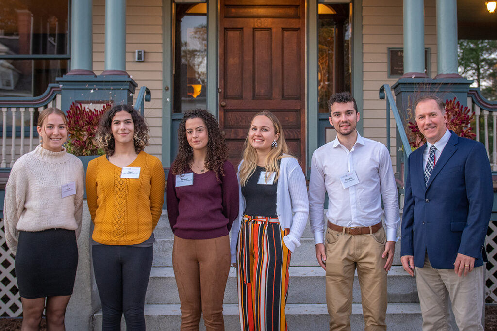 Steinbrecher Fellows for 2021 are (left to right) Kate Rivard-Lentz ’22, Claire Isabella Cohen ’22, Raquel Jorge Fernandes ’23, Colleen Falconer ’22, and Thomas Mueller ’22 with President David Fithian ’87