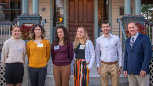 Steinbrecher Fellows for 2021 are (left to right) Kate Rivard-Lentz ’22, Claire Isabella Cohen ’22, Raquel Jorge Fernandes ’23, Colleen Falconer ’22, and Thomas Mueller ’22 with President David Fithian ’87