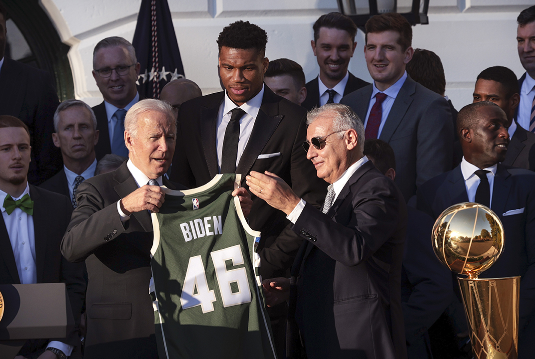 Marc Lasry presents President Joe Biden with a Bucks jersey at the White House