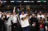 Marc Lasry holds the NBA Championship after the Milwaukee Bucks defeated the Phoenix Suns on July 20, 2021.