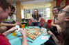 students playing board game
